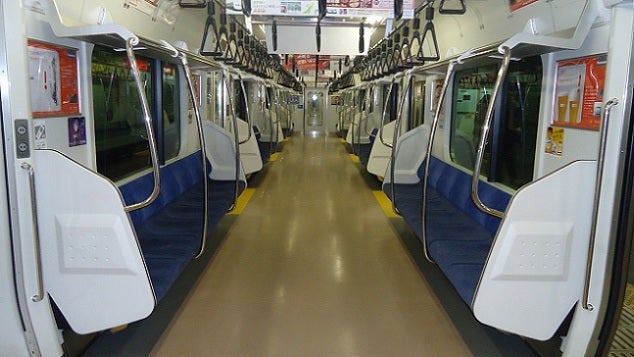 Bench seating inside a Japanese commuter train