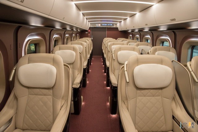 Spacious Green Car seating on a Japanese train